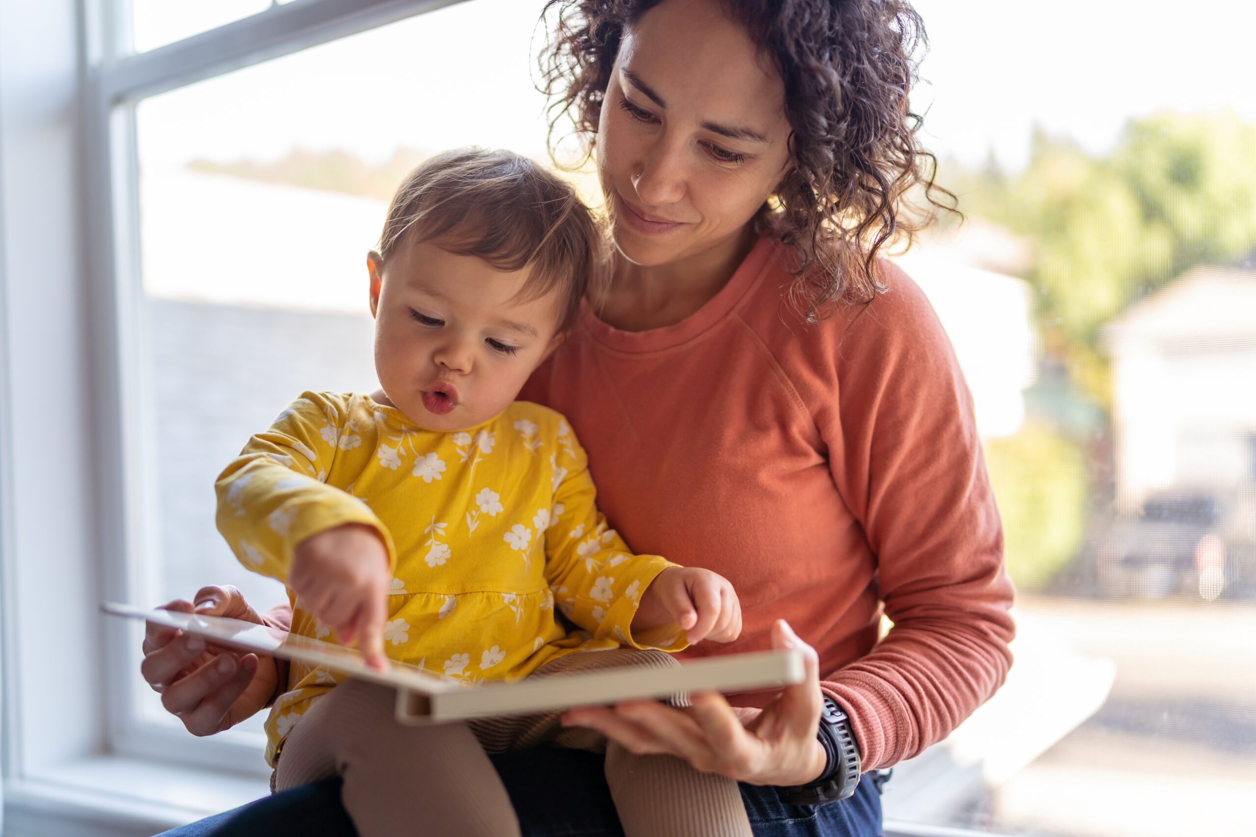 Mother reading to her child